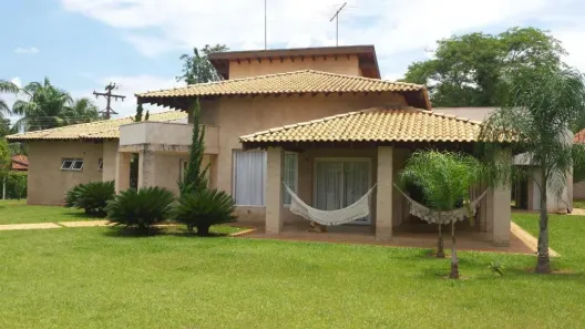 Casa de Condomínio com 4 Quartos à venda, 400m² no Núcleo Urbano Monte Carlo, Guapiaçu