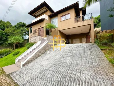 Casa de Condomínio com 4 Quartos para alugar, 242m² no Jansen, Gravataí