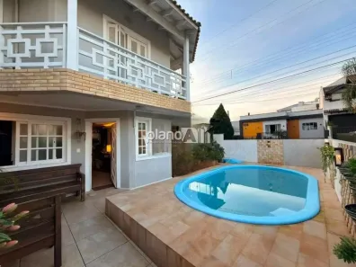 Casa com 3 Quartos para alugar, 112m² no Loteamento Jardim Timbaúva, Gravataí
