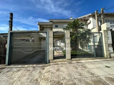 Casa com 3 Quartos para alugar, 150m² no Loteamento Jardim Timbaúva, Gravataí