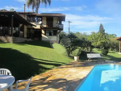 Casa de Condomínio com 3 Quartos à venda, 372m² no Cumbari, Mairiporã