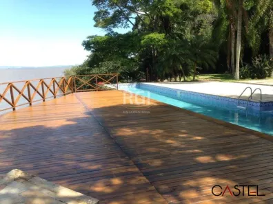 Casa de Condomínio com 4 Quartos à venda, 390m² no Ponta Grossa, Porto Alegre