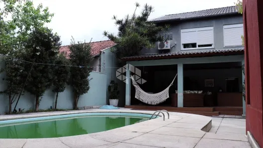 Casa com 4 Quartos à venda, 337m² no Santo Antônio, Porto Alegre