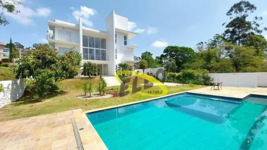 Casa de Condomínio com 4 Quartos para alugar, 566m² no Jardim Indaiá, Embu das Artes
