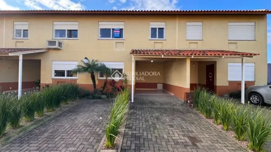 Casa de Condomínio com 3 Quartos para alugar, 100m² no Harmonia, Canoas