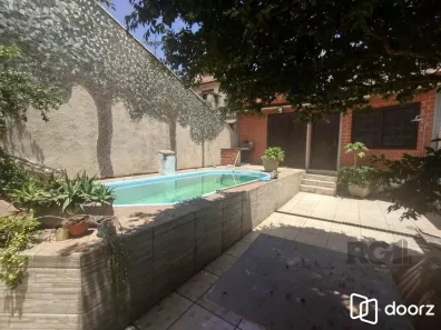 Casa com 4 Quartos à venda, 245m² no Cavalhada, Porto Alegre